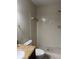 Bathroom featuring a tiled walk-in shower, granite vanity, and a white toilet at 3862 59Th W Ave # 4180, Bradenton, FL 34210