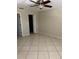 Empty bedroom with neutral paint, and light flooring and a closet in the corner at 3862 59Th W Ave # 4180, Bradenton, FL 34210