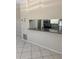 Kitchen area with granite countertops, stainless steel appliances, and an opening to the living room at 3862 59Th W Ave # 4180, Bradenton, FL 34210
