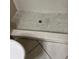 Tiled walk-in shower with neutral tile in a condo bathroom at 3862 59Th W Ave # 4180, Bradenton, FL 34210