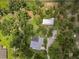 Aerial shot of the property showcasing the house and its surrounding landscape at 3863 Albin Ave, North Port, FL 34286