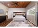 Bedroom featuring great natural light and wood flooring, providing a serene and inviting space at 3863 Albin Ave, North Port, FL 34286