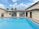 Large community pool with crystal-clear water and well-maintained, perfect for relaxation and recreation at 401 Airport E Ave # 304, Venice, FL 34285