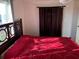 A bedroom with a window view and dark-brown curtains at 411 Vasto Dr, Venice, FL 34285