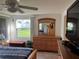 Bedroom with natural light and view of the front yard at 411 Vasto Dr, Venice, FL 34285