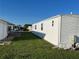 Bright, white home with ample yard space at 411 Vasto Dr, Venice, FL 34285