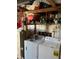 Laundry room with washer, dryer, and storage shelving at 411 Vasto Dr, Venice, FL 34285