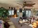 Inviting living space with comfortable seating and a dining area with table and chairs at 411 Vasto Dr, Venice, FL 34285