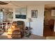 Open-concept design featuring a cozy sitting area and dining space at 411 Vasto Dr, Venice, FL 34285