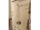 Bathroom shower with white showerhead and curtain at 411 Vasto Dr, Venice, FL 34285
