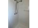 The second half bath features a shower at 411 Vasto Dr, Venice, FL 34285