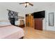 Comfortable bedroom with wood floors, natural light, closet and storage space at 4227 Blossom Rd, Venice, FL 34293