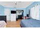 Spacious bedroom with wood floors, natural light, closet space and workstation at 4227 Blossom Rd, Venice, FL 34293