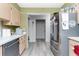 Functional kitchen featuring appliances and ample countertop space at 4227 Blossom Rd, Venice, FL 34293