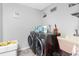 Well-equipped laundry room featuring modern washer and dryer with storage at 4227 Blossom Rd, Venice, FL 34293