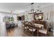Open living space with a dining area, living room, and access to the outdoor patio at 4260 Wordsworth Way, Venice, FL 34293
