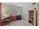 Bedroom with window, closet and bookcase at 437 Cerromar Ln # 414, Venice, FL 34293