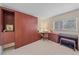 Bedroom featuring a built-in wardrobe, desk and storage at 437 Cerromar Ln # 414, Venice, FL 34293