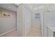 Kitchen shows closet, refrigerator and tile floors at 437 Cerromar Ln # 414, Venice, FL 34293