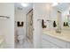 Bathroom featuring a toilet, shower, and single sink vanity at 437 Cerromar Ln # 513, Venice, FL 34293