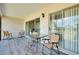 Relaxing outdoor patio with seating, ideal for enjoying the fresh air and views at 437 Cerromar Ln # 513, Venice, FL 34293