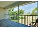 Screened patio with views of lush landscaping and a well-maintained golf course at 437 Cerromar Ln # 513, Venice, FL 34293