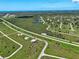 Aerial view of a home in a rural area with easy access to the beach and natural waterways at 48 Lark Dr, Placida, FL 33946