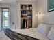 Bedroom closet featuring a custom organization system, and natural light from exterior at 48 Lark Dr, Placida, FL 33946
