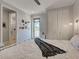 Bright bedroom with access to outdoor balcony, closet and ensuite bathroom at 48 Lark Dr, Placida, FL 33946
