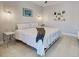 Well-lit bedroom features stylish decor, and tranquil design elements at 48 Lark Dr, Placida, FL 33946