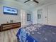 Bedroom with stylish décor, TV, and multiple doorways at 48 Lark Dr, Placida, FL 33946