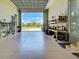 Open garage space with yard equipment and exterior view at 48 Lark Dr, Placida, FL 33946