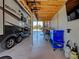Large garage with RV parking and storage space, tools, and workbench at 48 Lark Dr, Placida, FL 33946