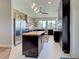 Spacious kitchen features a center island, stainless steel appliances, and ample cabinet space at 48 Lark Dr, Placida, FL 33946