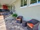 Charming outdoor patio with seating, perfect for enjoying the outdoors at 48 Lark Dr, Placida, FL 33946