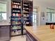 Spacious pantry with custom shelving provides abundant storage at 48 Lark Dr, Placida, FL 33946