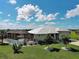 Single Gathering home featuring a screen enclosed pool and beautiful yard at 48 Lark Dr, Placida, FL 33946