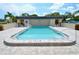 Refreshing community swimming pool with a zero-entry side and maintained shallow end at 528 Barcelona Ave # 216, Venice, FL 34285