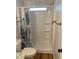 Bathroom featuring a shower with a patterned shower curtain and white interior at 529 Cervina S Dr, Venice, FL 34285