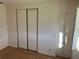 Bedroom with modern light wood flooring and closet at 529 Cervina S Dr, Venice, FL 34285