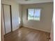 Bedroom with modern light wood flooring and closet at 529 Cervina S Dr, Venice, FL 34285