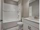 Bathroom featuring a tub, shower, and vanity with white cabinets and granite countertop at 5832 Semolino St, Nokomis, FL 34275