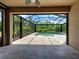 View of the lanai featuring a pool and the travertine tile deck at 5832 Semolino St, Nokomis, FL 34275
