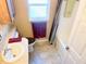This bright bathroom includes a bathtub with shower and vanity sink at 660 N Green Cir, Venice, FL 34285