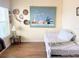 This cozy room includes a twin bed and unique decor for a personalized touch at 660 N Green Cir, Venice, FL 34285