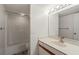 Bathroom featuring a vanity with a sink, mirror, and shower-tub combo at 6800 Placida Rd # 280, Englewood, FL 34224