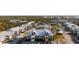 Scenic community featuring multiple buildings, a swimming pool, tennis court, parking, and lush landscaping at 6800 Placida Rd # 280, Englewood, FL 34224