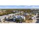 Scenic community featuring multiple buildings, a swimming pool, tennis court, parking, and lush landscaping at 6800 Placida Rd # 280, Englewood, FL 34224