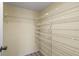 Walk-in closet with multiple tiers of wire shelving at 6800 Placida Rd # 280, Englewood, FL 34224