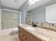 Bathroom showcasing granite countertop, tiled backsplash and glass enclosed shower at 6964 Glacier Ave, North Port, FL 34291